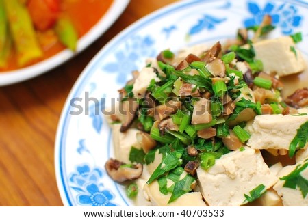 Simple, home cooked Chinese vegetarian cuisine. Ingredients include green, leafy vegetables, bean curd and mushrooms. Suitable for food and beverage, travel, healthy lifestyle, and diet and nutrition.