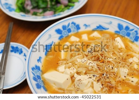 Home cooked Chinese vegetarian bean curd cuisine. Ingredients include bean curd and mushrooms. Suitable for food and beverage, healthy eating and lifestyle, and diet and nutrition.