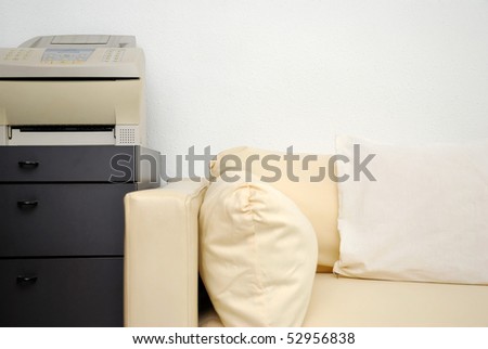 Modern sofa with fax machine. For office objects, working life, business and lifestyle concepts.