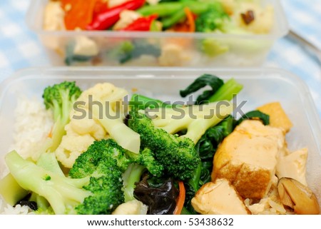 Packed Chinese set lunch or dinner with variety of colorful vegetables such as broccoli and cauliflower. Suitable for food and busy work life, healthy eating and diet and nutrition concepts.