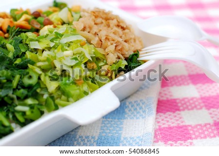 Packed meal with variety of healthy green vegetables. Suitable for concepts such as diet and nutrition, healthy lifestyle, and food and beverage.
