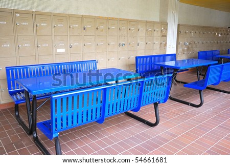 Row of study benches with meal lockers in background. For study and education, school and examination concepts.