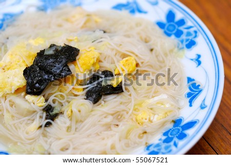 Simple Chinese noodles cooked with scrambled. Suitable for concepts such as healthy eating and lifestyle, and food and beverage.