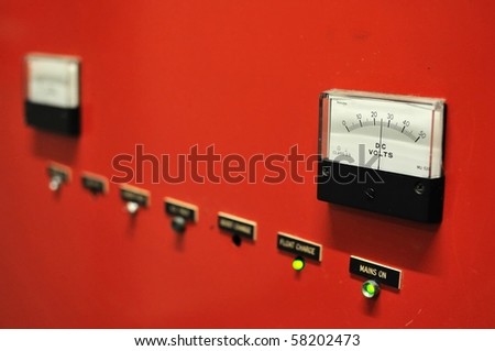 Red electricity meter showing voltage. For concepts such as electricity, energy, and industrial concepts.