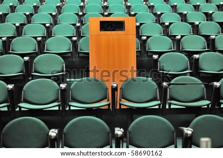 Lecture theater seating. For concepts such as school and education, business and training, and meetings and conferences.