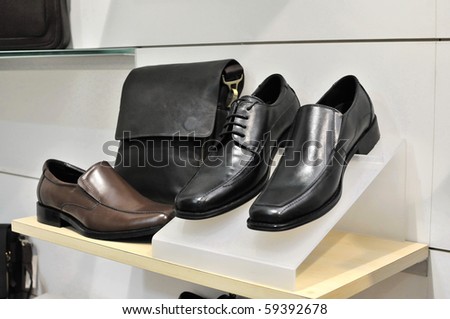 Business bag and back shoes on display. For concepts such as business and executive, and self grooming.