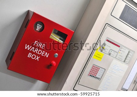 Red fire warden box for concepts such as emergency, fire, help, and assistance.