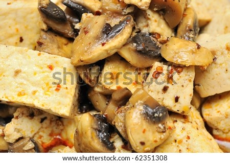 Closeup shot of bean curd delicacy cooked Asian style. Suitable for food and beverage, healthy lifestyle, and diet and nutrition.
