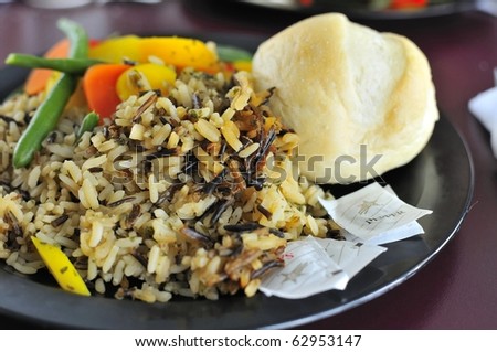 Healthy unpolished rice and bread for a balanced meal. For a healthy and nutritious lifestyle.