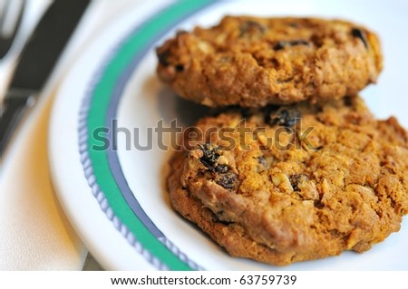 Chocolate chip cookies for an after meal snack, showing detail and texture.