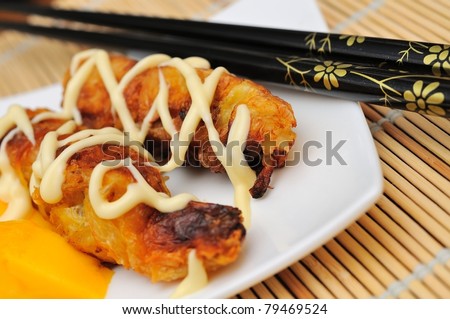 Special oriental seafood cuisine topped with mayo sauce.