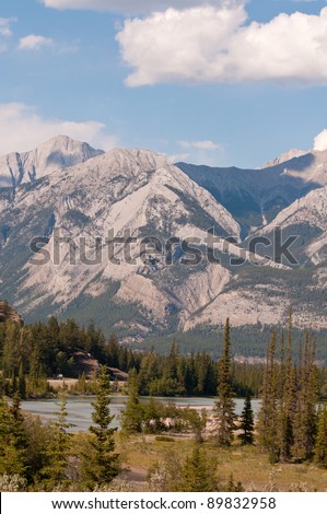 Tundra region of Jasper National Park in Canada with bare mountains after snow melt.