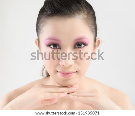 Chinese beauty with professional makeup in photography studio