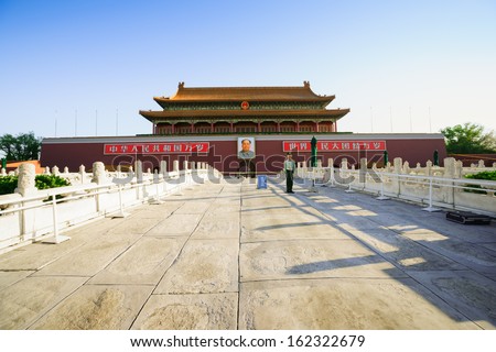 Beijing - May 30, 2012: A Chinese soldier in front of the Tiananmen Gate of Heavenly Peace.Tiananmen Gate is not only the famous ancient Chinese architecture,also the landmark of Beijing
