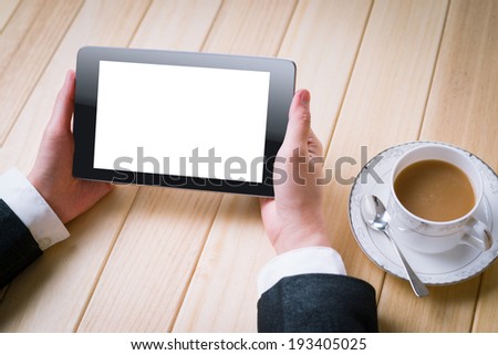 business woman reading information with tablet PC