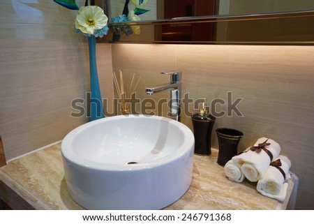 tap and sink in modern bathroom