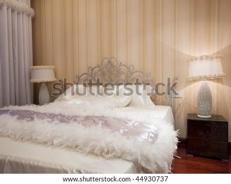luxury bedroom interior with beautiful wallpaper