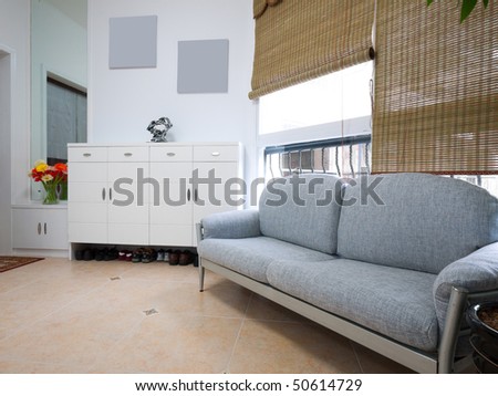 living room with sofa and cabinet