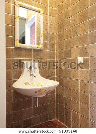 modern washroom interior with mirror,tap and sink