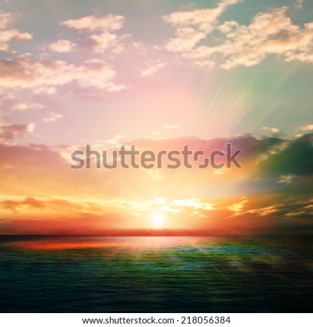 abstract nature background with sunrise and green ocean