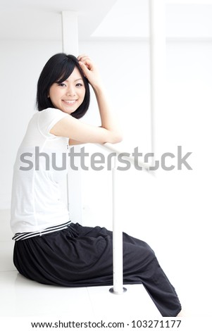 attractive asian woman relaxing in the house