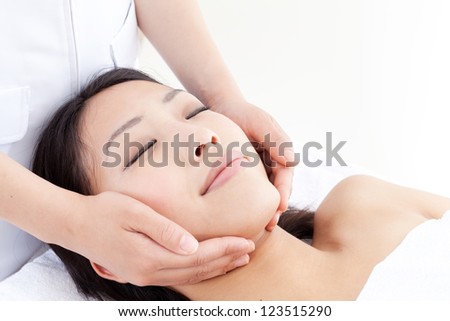 attractive asian woman skin care image on white background