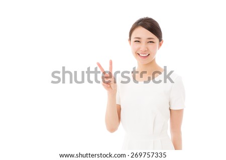attractive asian woman wearing white clothes on white background