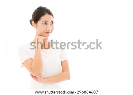 attractive asian woman wearing white clothes on white background