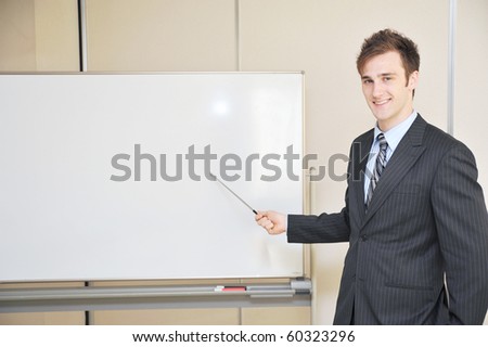 young business man explain at the whiteboard