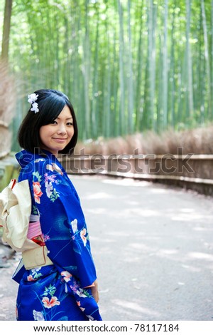a portrait of japanese kimono woman in the bamboo forest