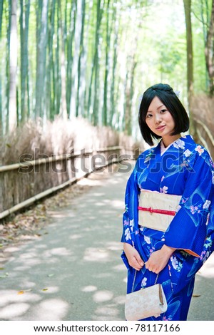 a portrait of japanese kimono woman in the bamboo forest