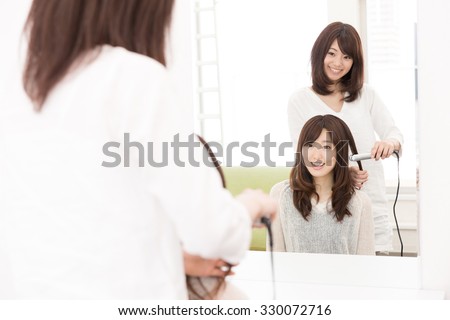 attractive asian woman in the hair salon