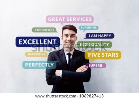 Customer Experience Concept. Happy Young Client standing at the Wall, Smiling and Crossed Arms, Looking at camera. Surrounded by Positive Review in Speech Bubble