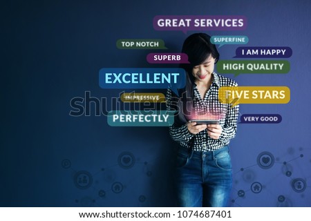 Customer Experience Concept. Soft focus of Happy Client standing at the Wall, Smiling while using Smartphone. Surrounded by Positive Review in Speech Bubble and Social Network icons