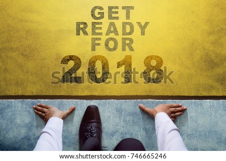 Concept for 2018 Year, Top view of Businessman on Start line, Ready for New Year in Business Challenge