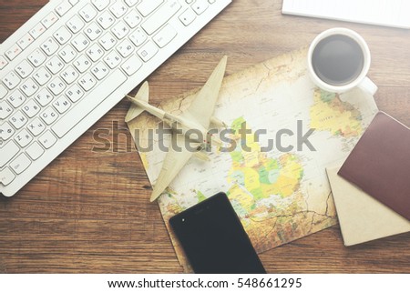 Preparation for travel concept,keyboar,coffee,map and phone