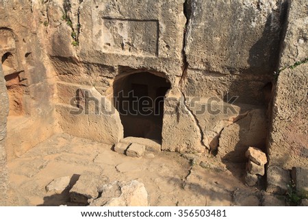 Entrance to the stone tombs of the kings in Paphos, close-up. Cyprus