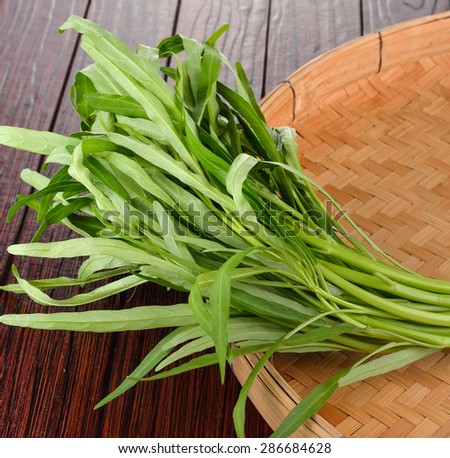 Water spinach , Morning Glory  on bamboo background