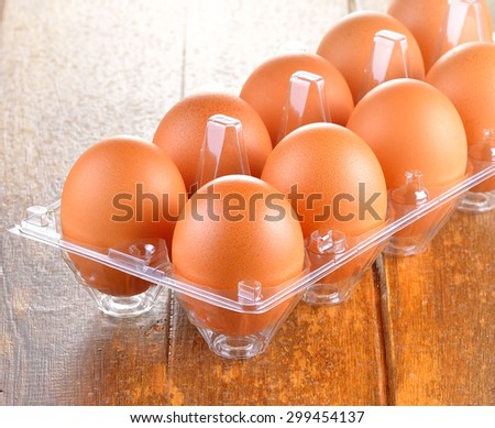 Fresh egg on plastic tray