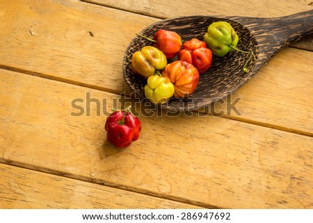 wood table spoon of fresh fruit, organic fruit And Vintage