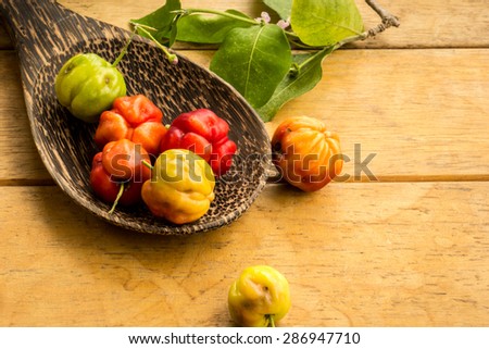 wood table spoon of fresh fruit, organic fruit And Vintage