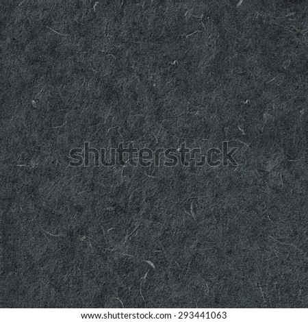Close-up of Handmade fiber organic paper texture. Black background. Craft eco recycle coated handmade textured paper. Useful for scrapbooking and greeting, oriental cards design. Mulberry, Sa paper.