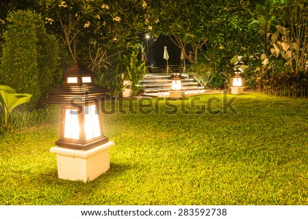 Garden lamp in garden at night