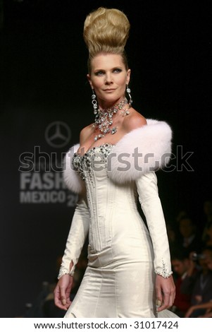 MEXICO CITY -  MAY 18: A model walks the runway wearing Alberto Rodriguez Autumn/Winter 2009 during Mercedes-Benz Fashion Mexico Autum/Winter 2009 May 18, 2009 in Mexico City.