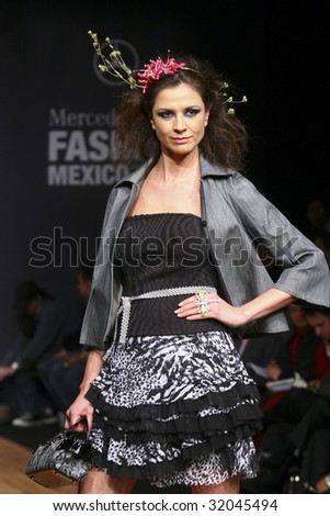 MEXICO CITY - MAY 18: A model walks the runway wearing Blanca Estela Sanchez Autumn/Winter 2009 during Mercedes-Benz Fashion Mexico Autum/Winter 2009 May 18, 2009 in Mexico City.