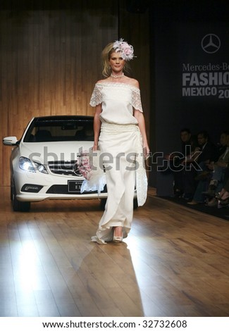 MEXICO CITY - MAY 20: A model walks the runway wearing Lydia Lavin Autumn/Winter 2009 during Mercedes-Benz Fashion Mexico Autum/Winter 2009 May 20, 2009 in Mexico City.