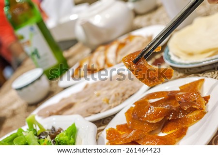 Eating roast duck at a Beijing roast duck restaurant