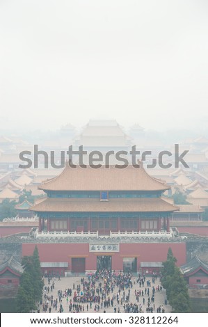 BEIJING, CHINA - OCT 9, 2014 - North gate of the Forbidden City shrouded in air pollution on Oct 19, 2014, in Beijing, China. Air pollution is becoming an increasing problem for China.
