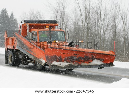 A snow plow truck ready for the storm