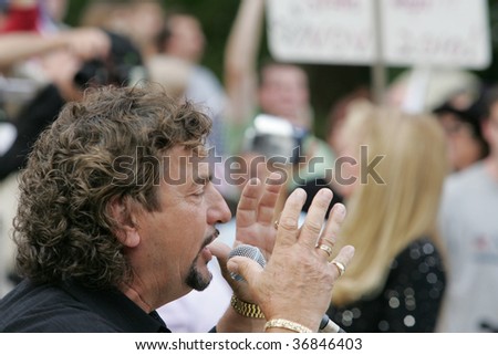 ALBANY, NY- SEPT 10: Singer Ron Rivoli gets the crowd ramped up during a stop of the Tea Party Express tour on September 10, 2009 in Albany NY